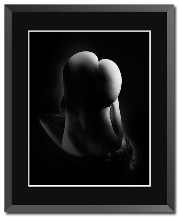 Fine art photograph of a femal bottom shaped like a heart